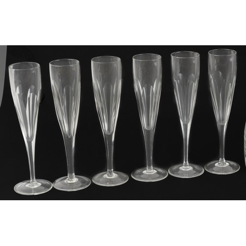 1338 - Georgian and later glassware comprising a water jug, bowl and cover, set of six Champagne flutes and... 