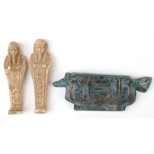 1501 - Two Egyptian style ushabtis and a faience glazed amulet, the largest 16cm wide