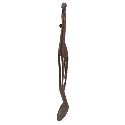 1594 - Large tribal interest treen spoon carved with a giraffe, 55cm in length