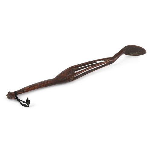 1594 - Large tribal interest treen spoon carved with a giraffe, 55cm in length