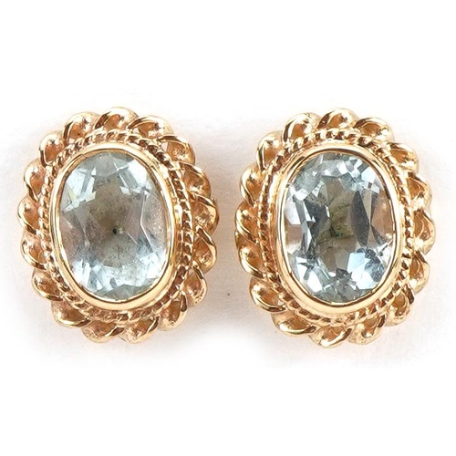 2143 - Pair of 9ct gold aquamarine stud earrings, 1.2cm high, 2.0g