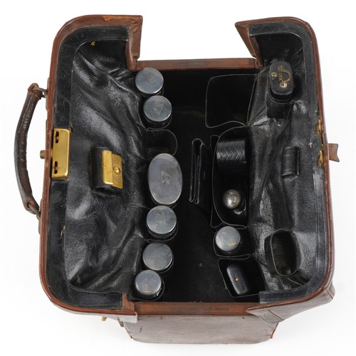 168 - Jenner & Knewstub, Victorian brown leather Gladstone bag with fitted interior housing seven matching... 