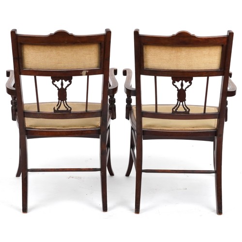 1153 - Four Edwardian inlaid mahogany salon chairs including two carvers, the largest each 90cm high