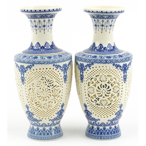 1829 - Chinese blue and white porcelain reticulated two piece flower vases decorated with flowers and child... 