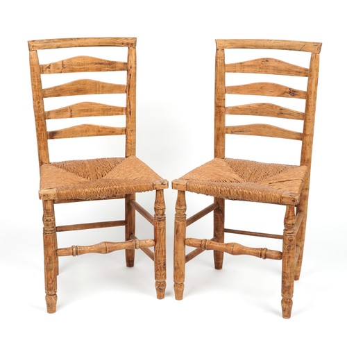 1035 - Pair of antique lightwood chairs with rush seats, each 93cm high