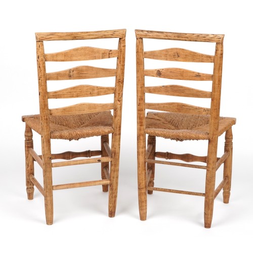 1035 - Pair of antique lightwood chairs with rush seats, each 93cm high