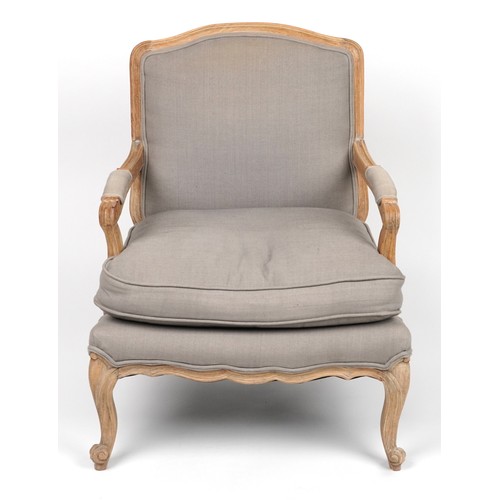 1038 - French style lightwood armchair with lift off cushion and grey upholstery, 89cm high