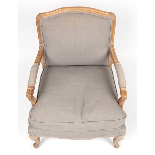 1038 - French style lightwood armchair with lift off cushion and grey upholstery, 89cm high