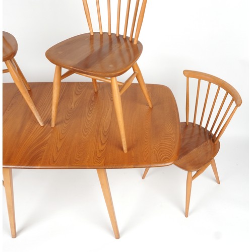 1032 - Ercol light elm dining table with four stick back chairs, the table 72cm H x 136.5cm W x 75cm D when... 