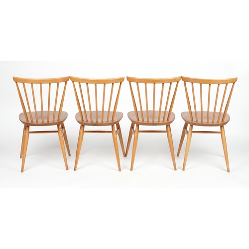 1032 - Ercol light elm dining table with four stick back chairs, the table 72cm H x 136.5cm W x 75cm D when... 