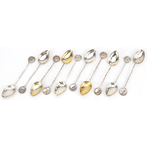 494 - Set of ten bowling interest silver teaspoons, T & Co maker's mark, various Birmingham dates, 11cm in... 