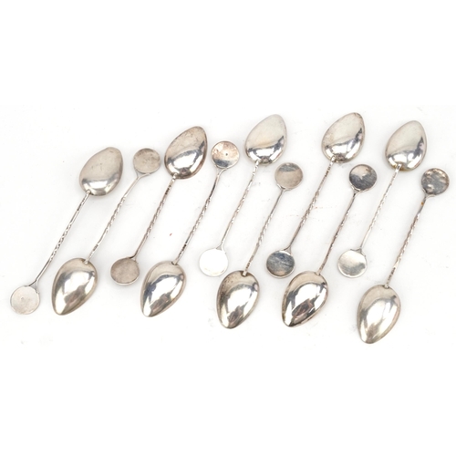 494 - Set of ten bowling interest silver teaspoons, T & Co maker's mark, various Birmingham dates, 11cm in... 