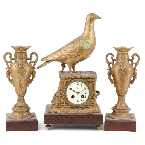 295 - 19th century continental gilt metal grouse design mantle clock with garniture vases, each raised on ... 