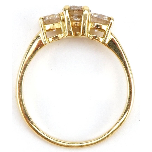 8 - Unmarked gold diamond three stone ring, tests as 18ct gold, total diamond weight approximately 1.80 ... 