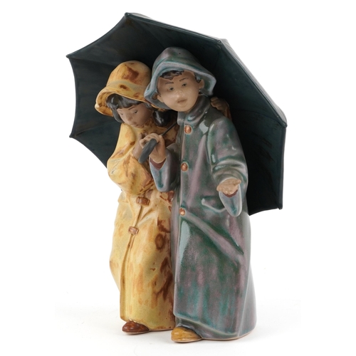 2260 - Lladro Gres Under the Rain figure group, 24.5cm high