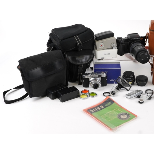 1062 - Vintage and later cameras and binoculars including Pentax SFXN, Dolland of London Standard 12 x 32 a... 