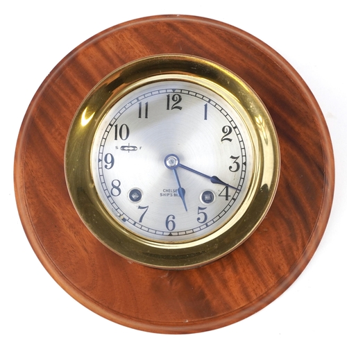 625 - Chelsea ship's bell brass bulkhead design wall clock with hardwood back and related paperwork, the b... 