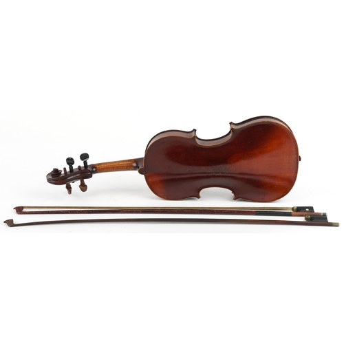 1012 - Old wooden violin with one piece back, bow and fitted wooden travelling case, the violin bearing a D... 