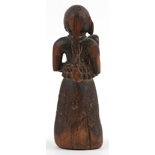 411 - African tribal interest carved wood maternity  figure of mother and child, 29.5cm high