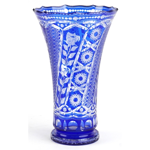 440 - Large Bohemian blue flashed cut glass vase etched with flowers, 38cm high