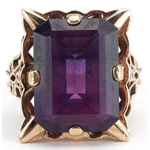 48 - Large 9ct gold alexandrite ring with pierced butterfly shoulders, the stone approximately 16.20mm x ... 