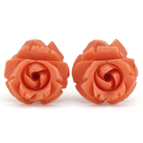 566 - Pair of yellow metal coral design flower head stud earrings, 1.8cm in diameter, 4.0g