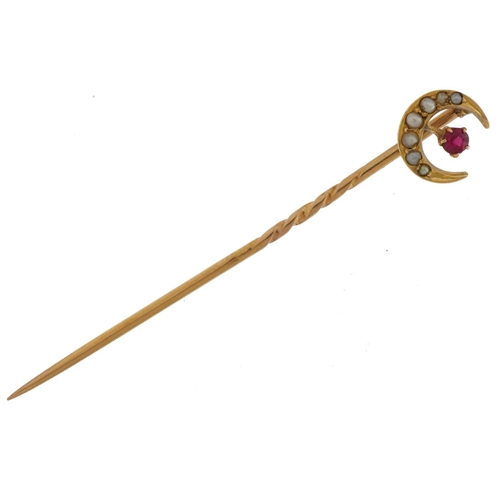 498 - Victorian unmarked gold ruby and seed pearl moon crest stickpin, tests as 15ct gold, housed in a Joh... 