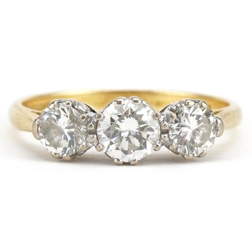 20 - 18ct gold diamond three stone ring, total diamond weight approximately 1.45 carat, size U, 4.5g