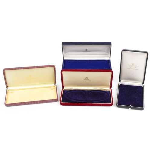 564 - Four Mikimoto pearl jewellery boxes and two leaflets, the largest 20.5cm in length