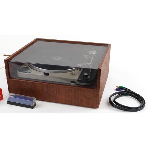 1022 - Thorens turntable housed in a teak display case with accessories, model TD124/II, 46cm wide