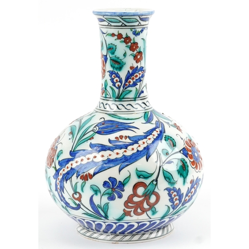 278 - Turkish Iznik pottery kendi hand painted with stylised flowers, 27.5cm high