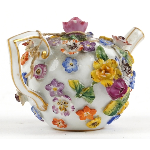 242 - Meissen, 19th century German porcelain floral encrusted miniature teapot, 9.5cm in length