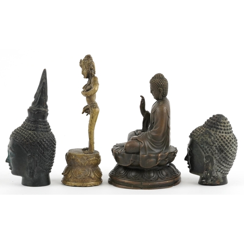 2702 - Tibetan and Indian bronzes including figure of seated Buddha, the largest 12cm high