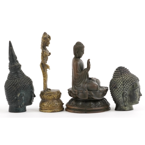 2702 - Tibetan and Indian bronzes including figure of seated Buddha, the largest 12cm high