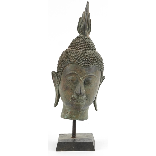 2732 - Chino Tibetan patinated bronze Buddha head on stand, 33.5cm high