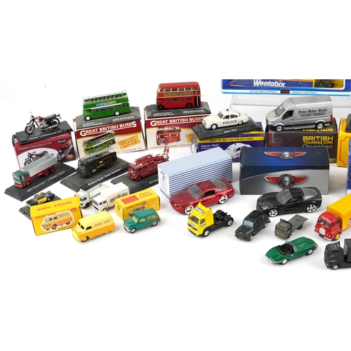 1167 - Diecast vehicles, mostly boxed, including Dinky, Eddie Stobart, Oxford, Corgi and Great British Buse... 