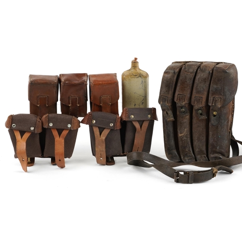 1405 - Militaria including leather ammunition cases, the largest 25.5cm high