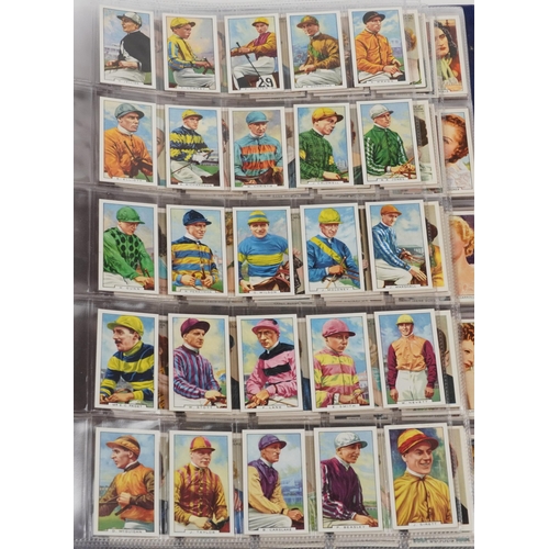 1667 - Large collection of cigarette cards, some arranged in albums, including John Players & Sons, Western... 