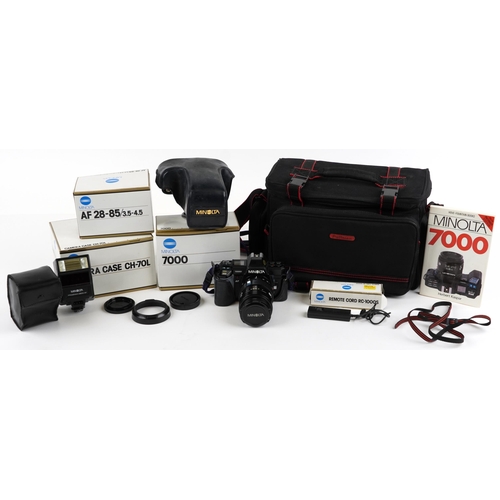 1060 - Cameras and accessories including Minolta 7000 and Pullman protective case