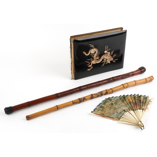 2569 - Japanese sundry items including brisee fan hand painted with a Geisha in a cart, black lacquered pho... 