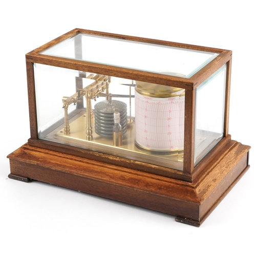 377 - Committee of London barograph housed in a glazed oak case with bevelled glass and base drawer, 22.5c... 