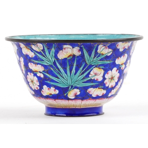 140 - Chinese Canton enamel bowl on saucer enamelled with flowers, character marks to the base of each, th... 