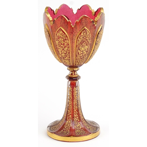 351 - Attributed to Moser, large 19th century Bohemian ruby glass goblet finely gilded with flowers amongs... 