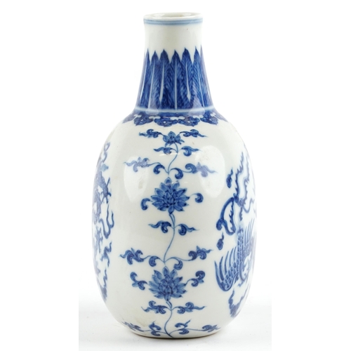 525 - Chinese blue and white porcelain moon flask hand painted with stylised roundels of dragons chasing a... 