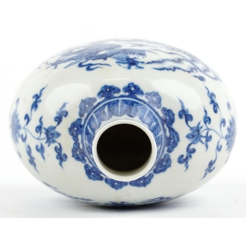 525 - Chinese blue and white porcelain moon flask hand painted with stylised roundels of dragons chasing a... 