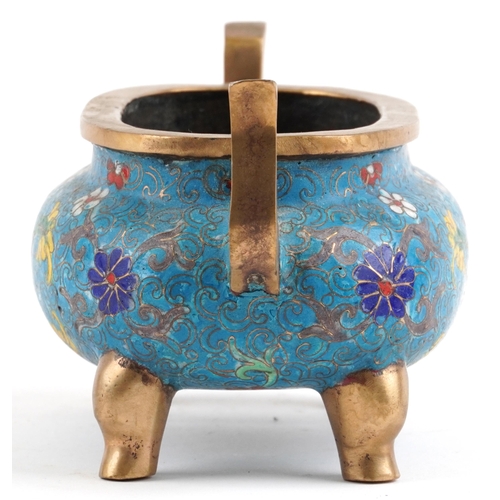 141 - Chinese patinated bronze cloisonne four footed censer with twin handles enamelled with flower heads ... 