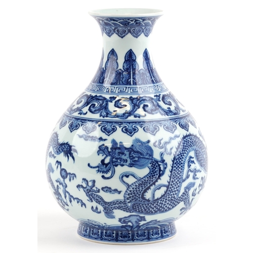 302 - Chinese blue and white porcelain vase hand painted with dragons chasing the flaming pearl amongst cl... 