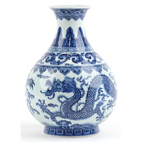 302 - Chinese blue and white porcelain vase hand painted with dragons chasing the flaming pearl amongst cl... 