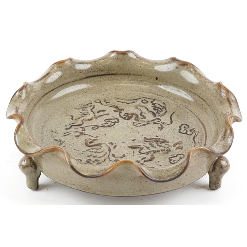 2716 - Chinese porcelain three footed censer having a grey glaze, decorated in low relief with phoenixes an... 