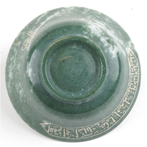 286 - Islamic green hardstone bowl carved with calligraphy, 11cm in diameter